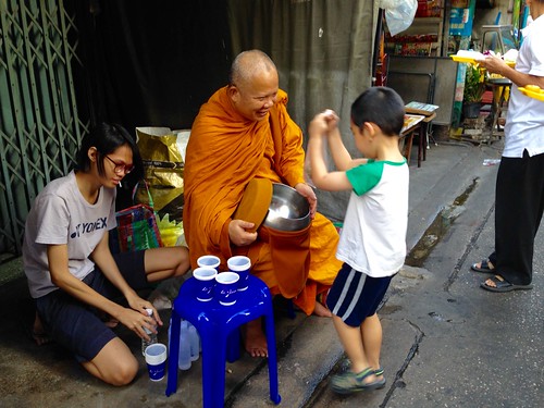 Wai phra at the local street market