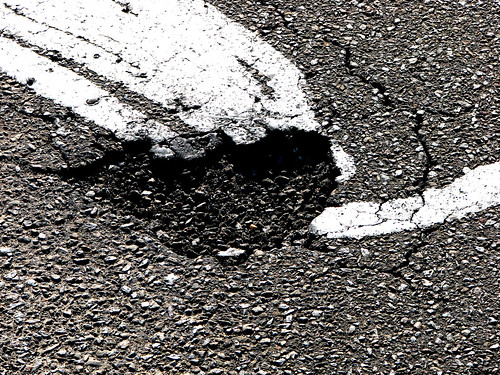 hole in asphalt