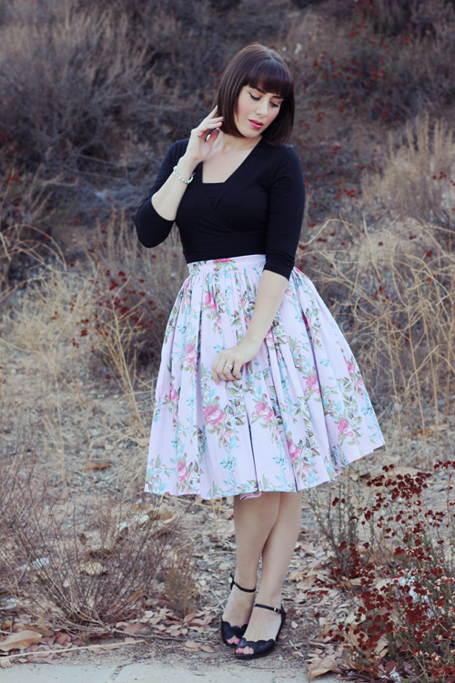 Pinup Girl Clothing Pinup Couture Jenny Skirt in Floral Ribbon Print Heart of Haute Sweet Sweater in Black