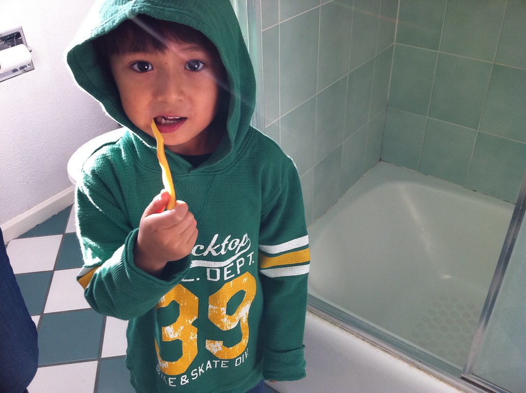 Kai brushing his teeth