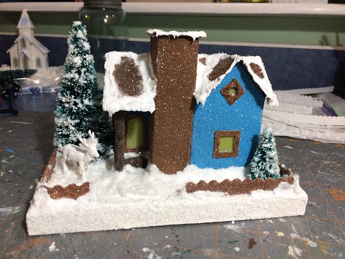 blue Putz house with chimney