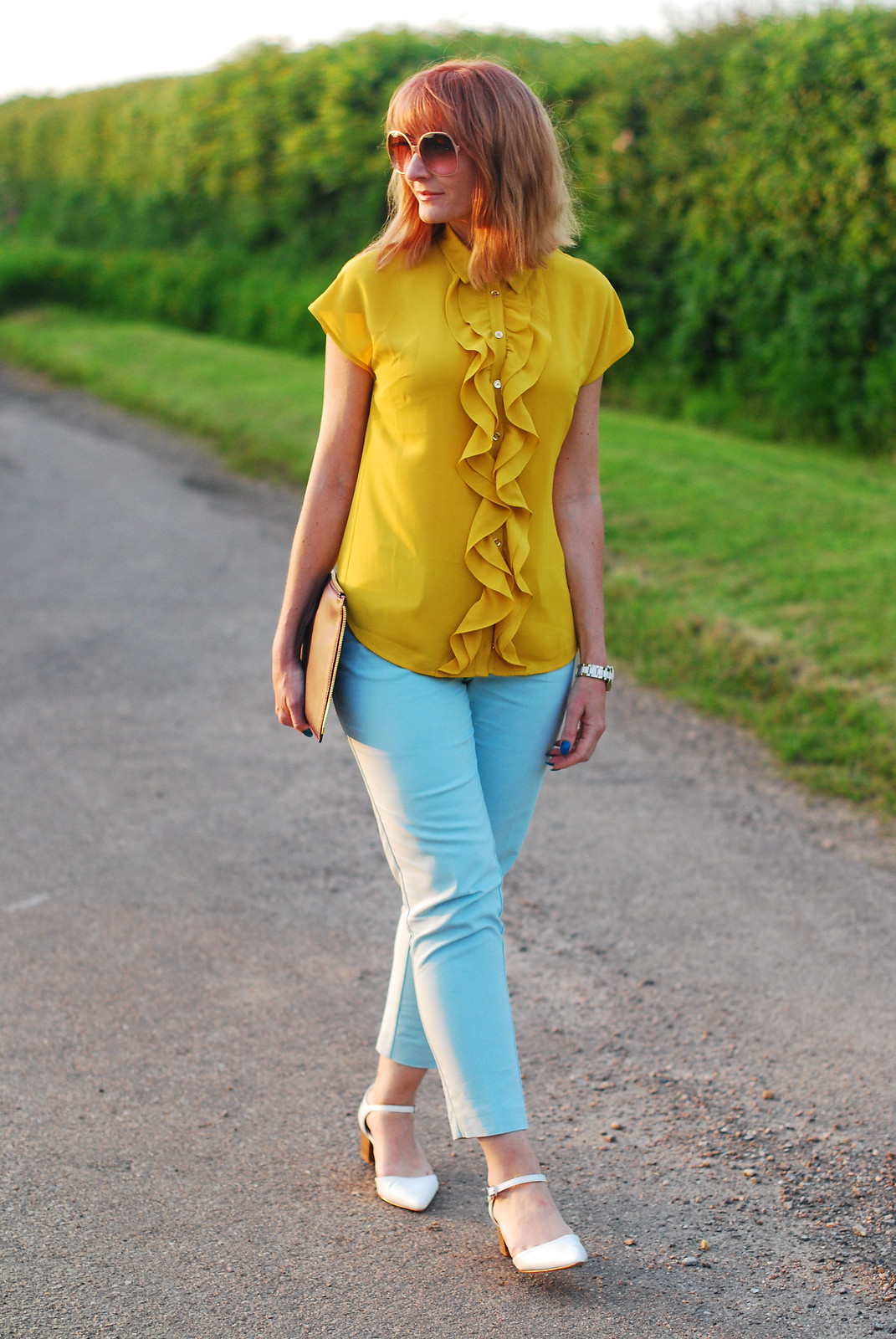 Summer brights: Ruffled yellow blouse, mint trousers, low pointed white heels, Jennifer Hamley Model KT Workbag clutch, oversized 70s sunglasses | Not Dressed As Lamb