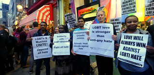 LGBT love is stronger than anti-gay hate - Peter Tatchell and other activists at London's vigil in memory of the victims of the Orlando gay nightclub terror attack.
