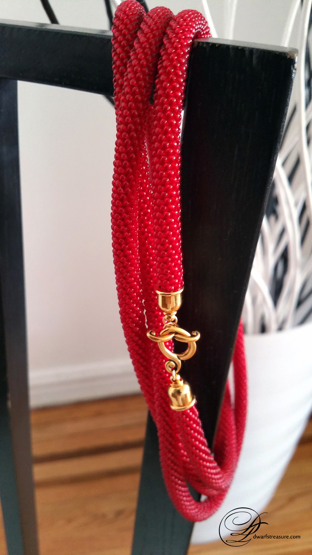 beautiful  beaded long necklace with gold toggle clasp