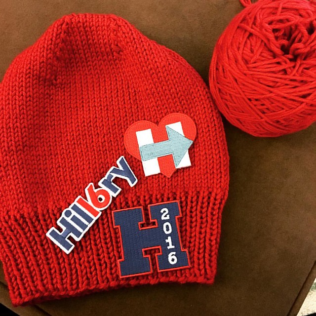 Decisions, decisions. Knit up a hat in support of @hillaryclinton and now I don't know which patch to add. #imwithher #knittersforhillary #nevernotknitting