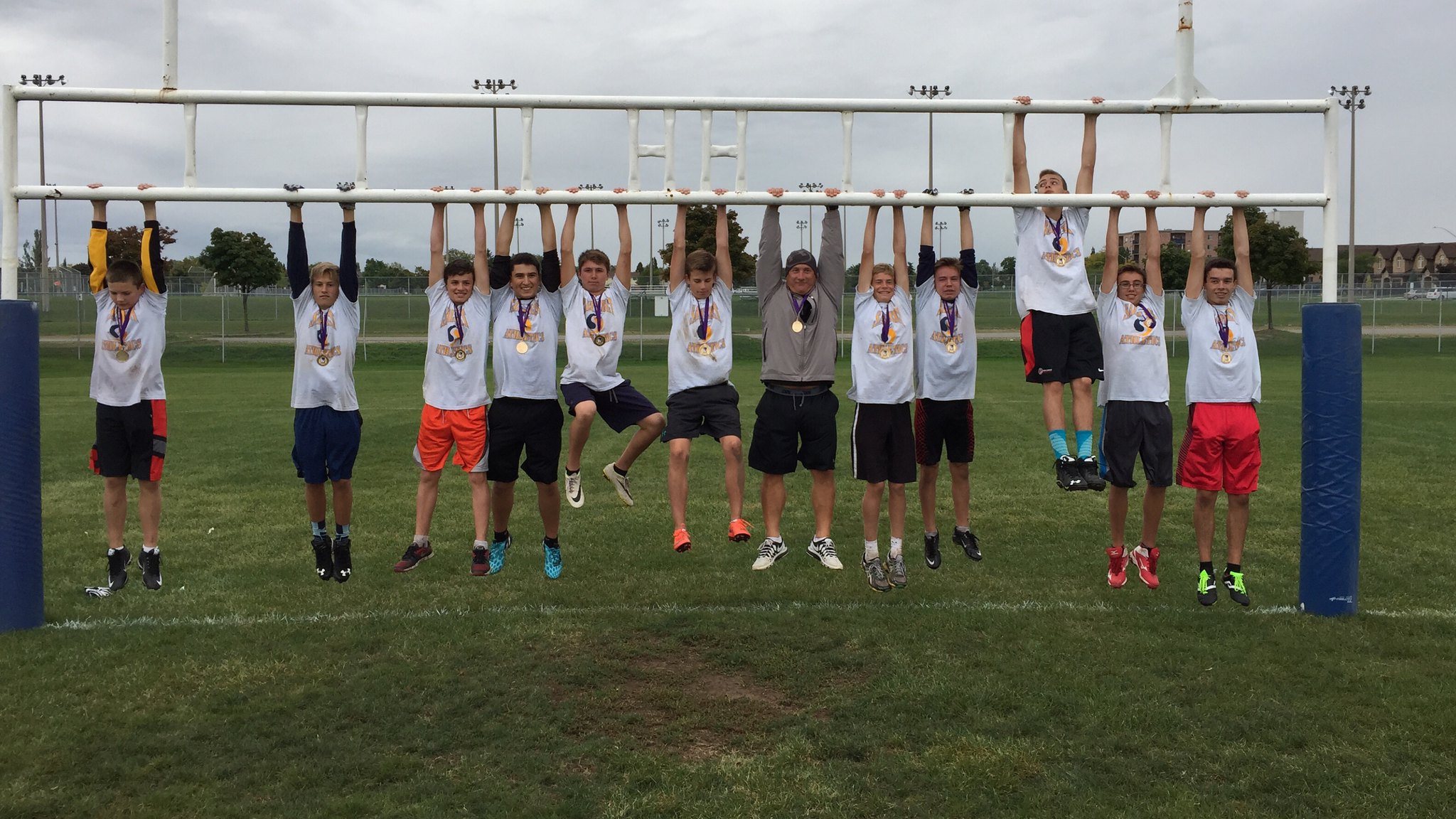 Saltfleet celebrates 2016 grade 9 boys touch football championship by hanging around.