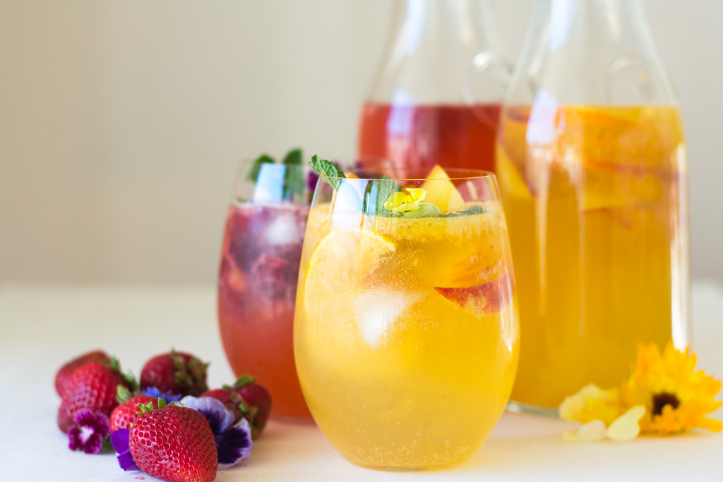 Strawberry Rose Sangria with rose water and Peach Orange sangria with orange blossom water.