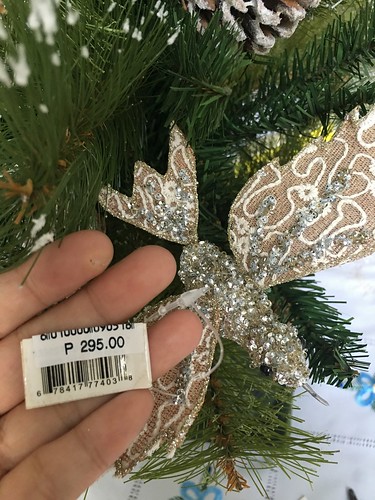 tag price of sequinned bird ornament