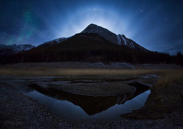 What a night up here in Jasper. Aurora borealis, Big Dipper, rising Orion, moon halo, converging clouds, perfect reflections - we saw it all, and sometimes all in the same scene, such as in this image taken at Medicine Lake around 2:30 AM. :-) A fitting w
