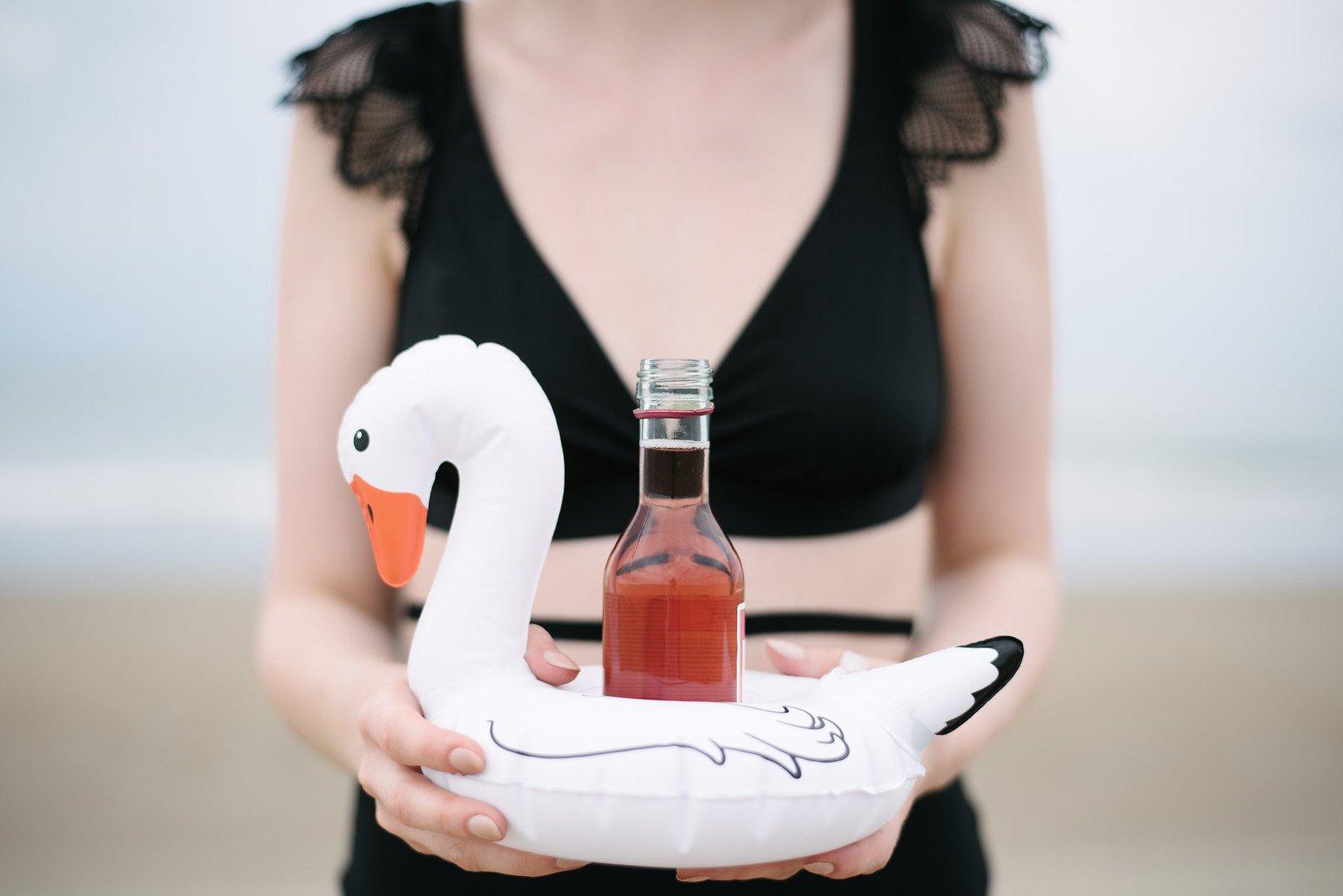 Mini Swan Float with a mini bottle of Rose on juliettelaura.blogspot.com